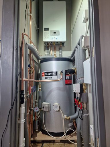 Water heater and piping installation in a narrow space.