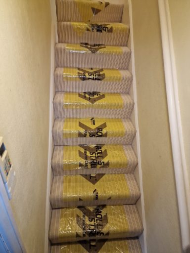 Carpet protection laid on customer stairs during works, showing our commitment to clean, careful workmanship and respect for every home.